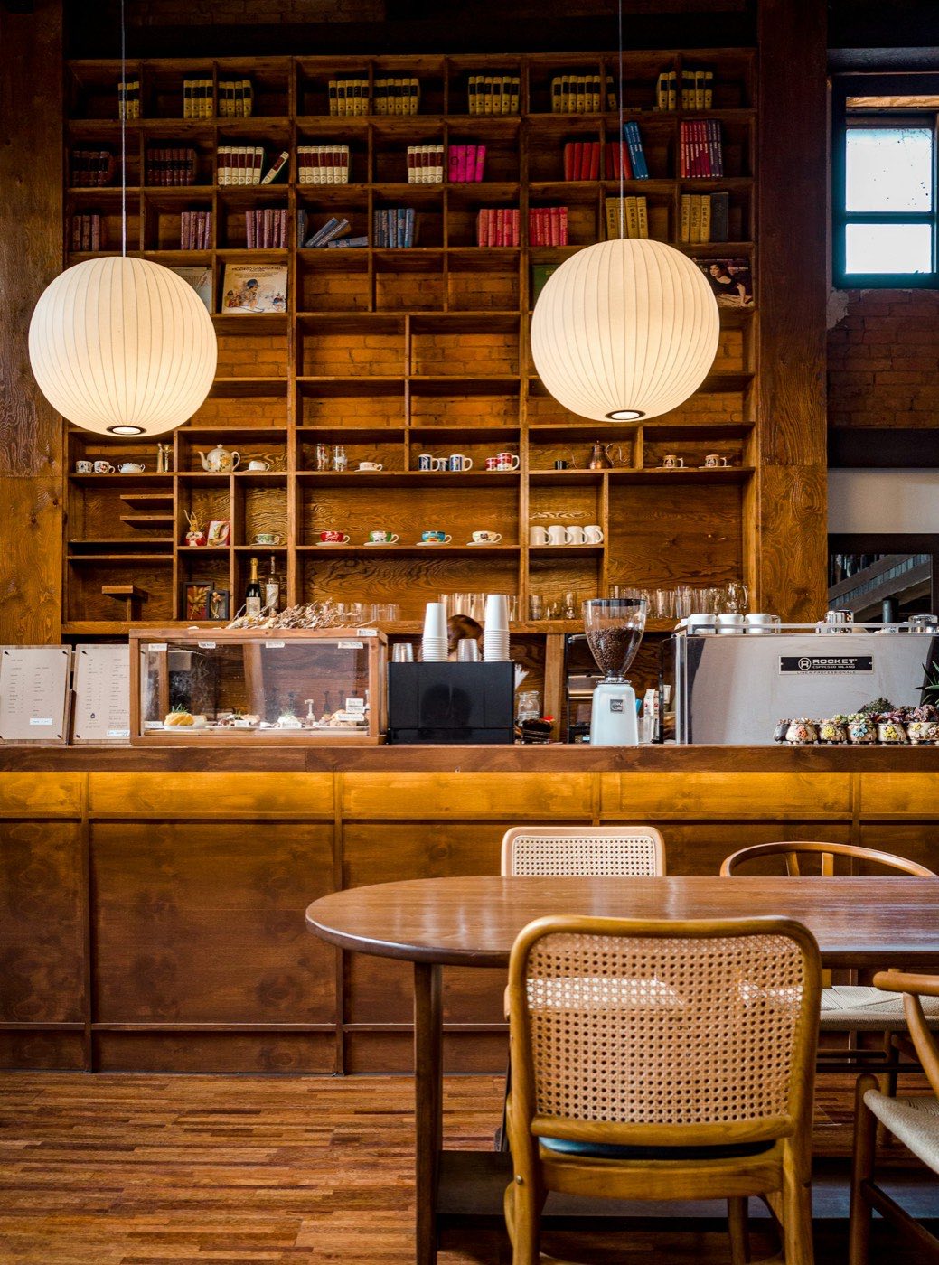 Ember & Oak interior detail with warm light through the window.